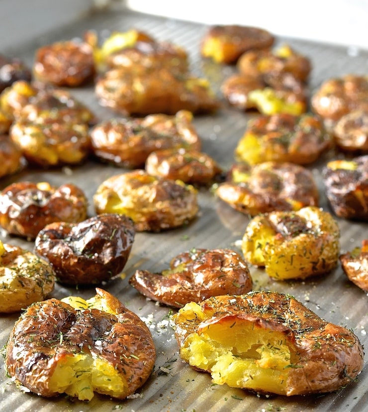 Take the humble potato to a whole new level with these extra crispy Dilly Smashed Baby Potatoes. Roasted, smashed, then roasted some more, their golden nubbliness is just irresistible. Serve them dripping in my mild & creamy horseradish sauce. Potato perfection.....