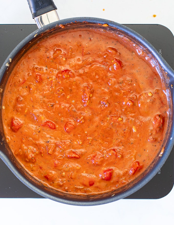 Cherry Tomato Sauce simmering in a pan