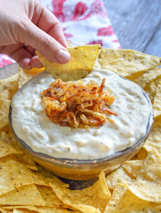 A deliciously cool, creamy & nut-free vegan Onion Garlic Dip. Full of sweet roasted garlic & caramelized onion flavour & perfect for your next party!