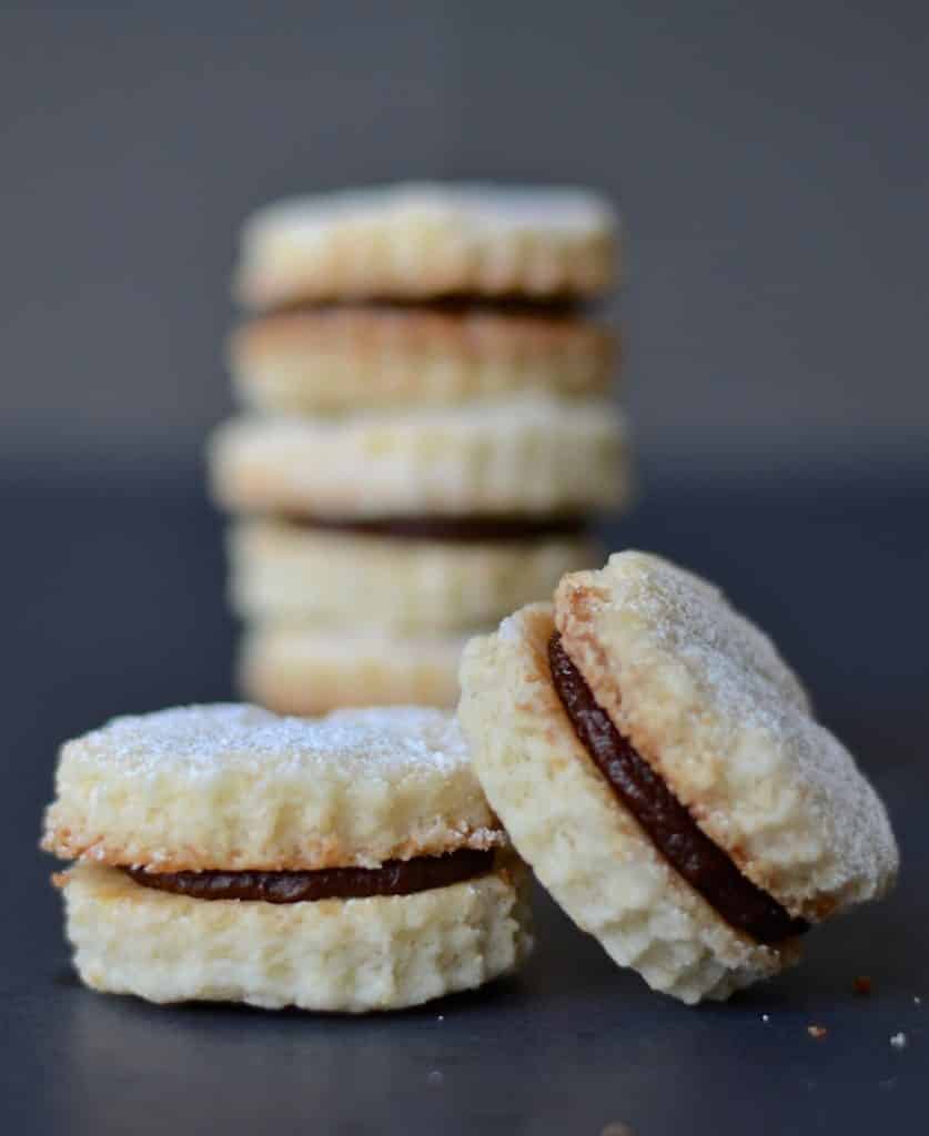 Melt in the mouth Vegan Coconut Cookies with Chocolate Cream. Beautifully short morsels of deliciousness! 