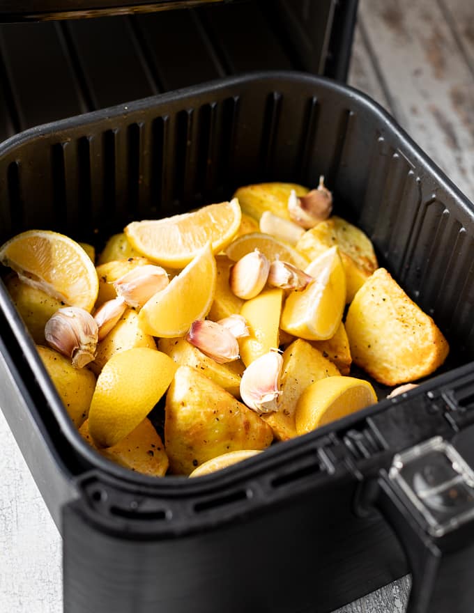 potatoes in an air fryer with lemon and garlic