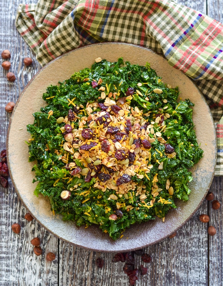 massaged kale salad scattered with savoury granola