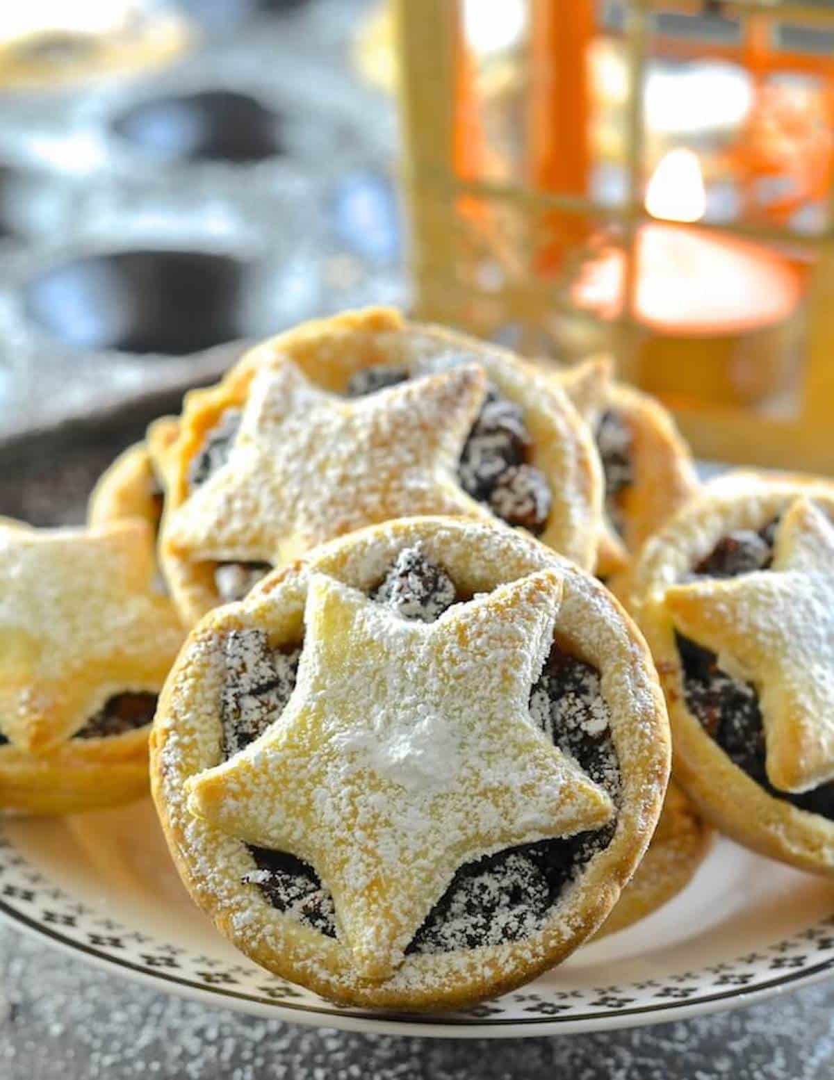 vegan mince pies with a candle in the background
