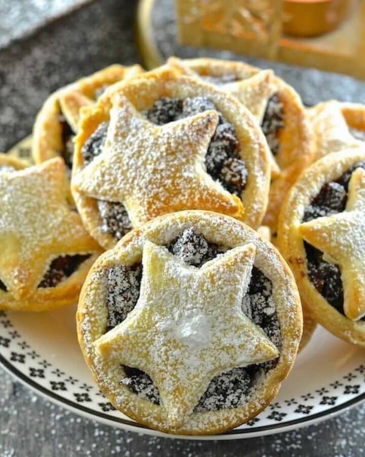 vegan mince pies piled on a plate