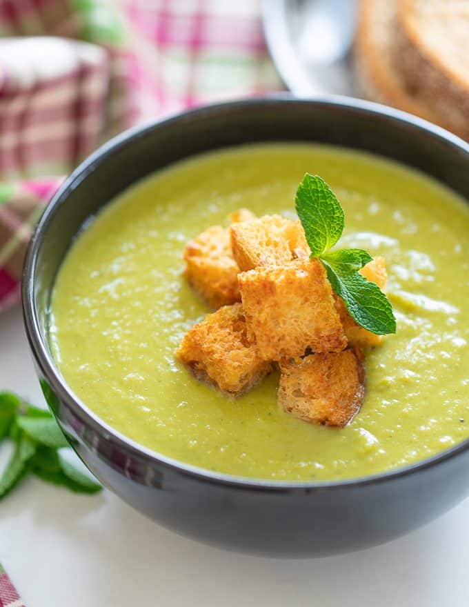 A bowl of brilliant green goodness to warm your soul! This Vegan Pea Soup with a generous handful of mint for good measure, is healthy, low calorie, packed with protein and super simple to make. With only 6 ingredients (plus salt & pepper) you probably already have everything you need to make it too!