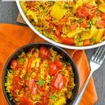 This One-Pot Spicy Vegetable Rice is our go to favourite mid-week dinner. 30 minutes & one pot is all that is standing between you & a big bowl full of deliciously spiced, flavourful rice studded with sweet, soft veggies.