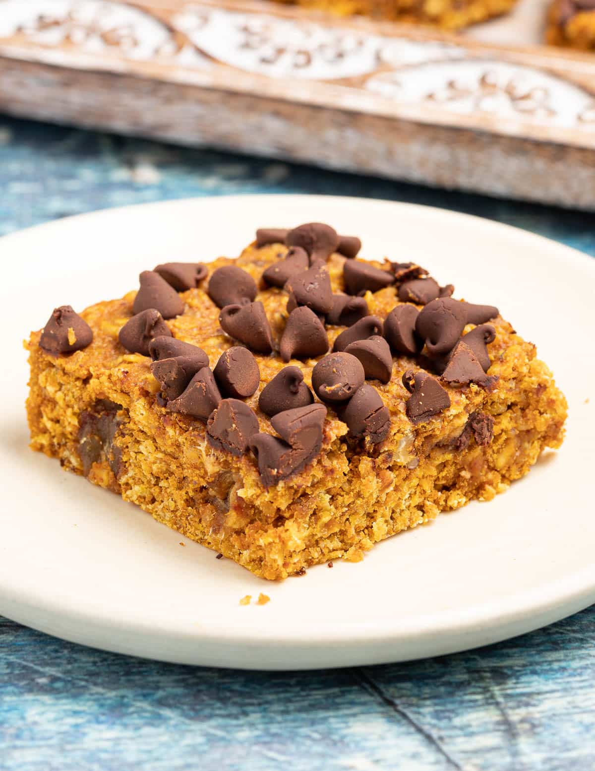 a pumpkin oatmeal bar topped with chocolate chips 
