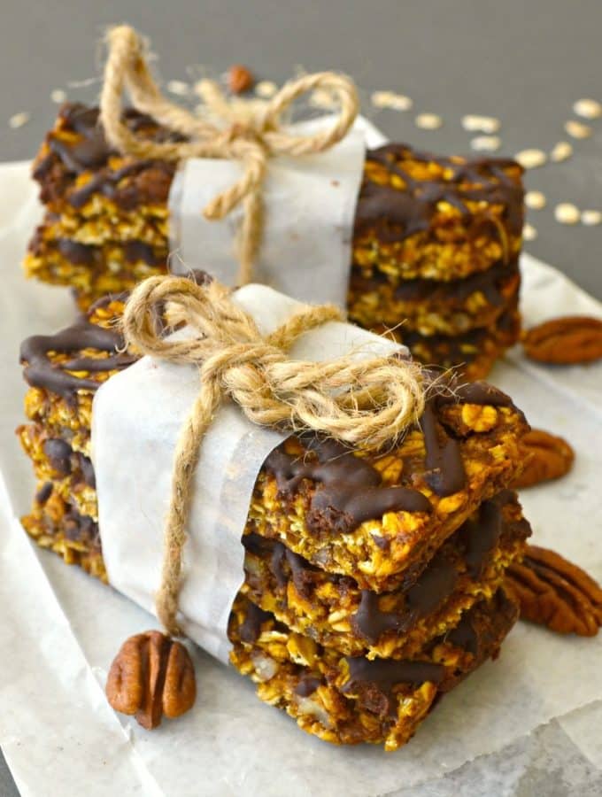 Deliciously soft & chewy, pumpkin granola bars with pecans & chocolate. Vegan, gluten free & perfect for Fall!