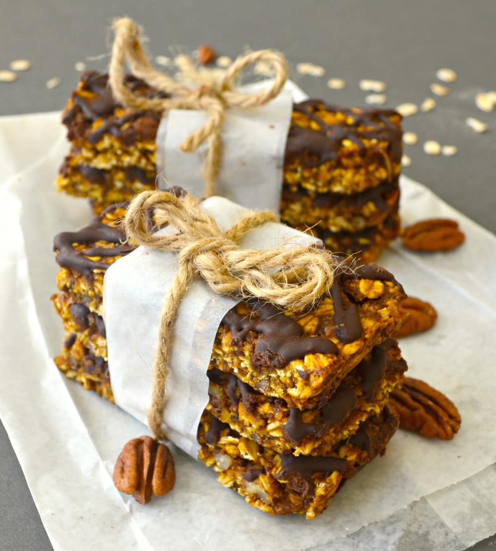 Deliciously soft & chewy, pumpkin granola bars with pecans & chocolate. Vegan, gluten free & perfect for Fall!