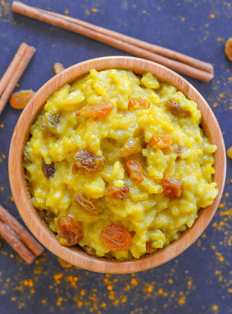 Fragrant, rich & deliciously creamy Slow Cooker Rice Pudding with Turmeric & Cinnamon. It's like golden milk but in dessert form & it will soothe & warm you right through to the soul! (If you don't have a slow cooker you can make it on the stove top instead).