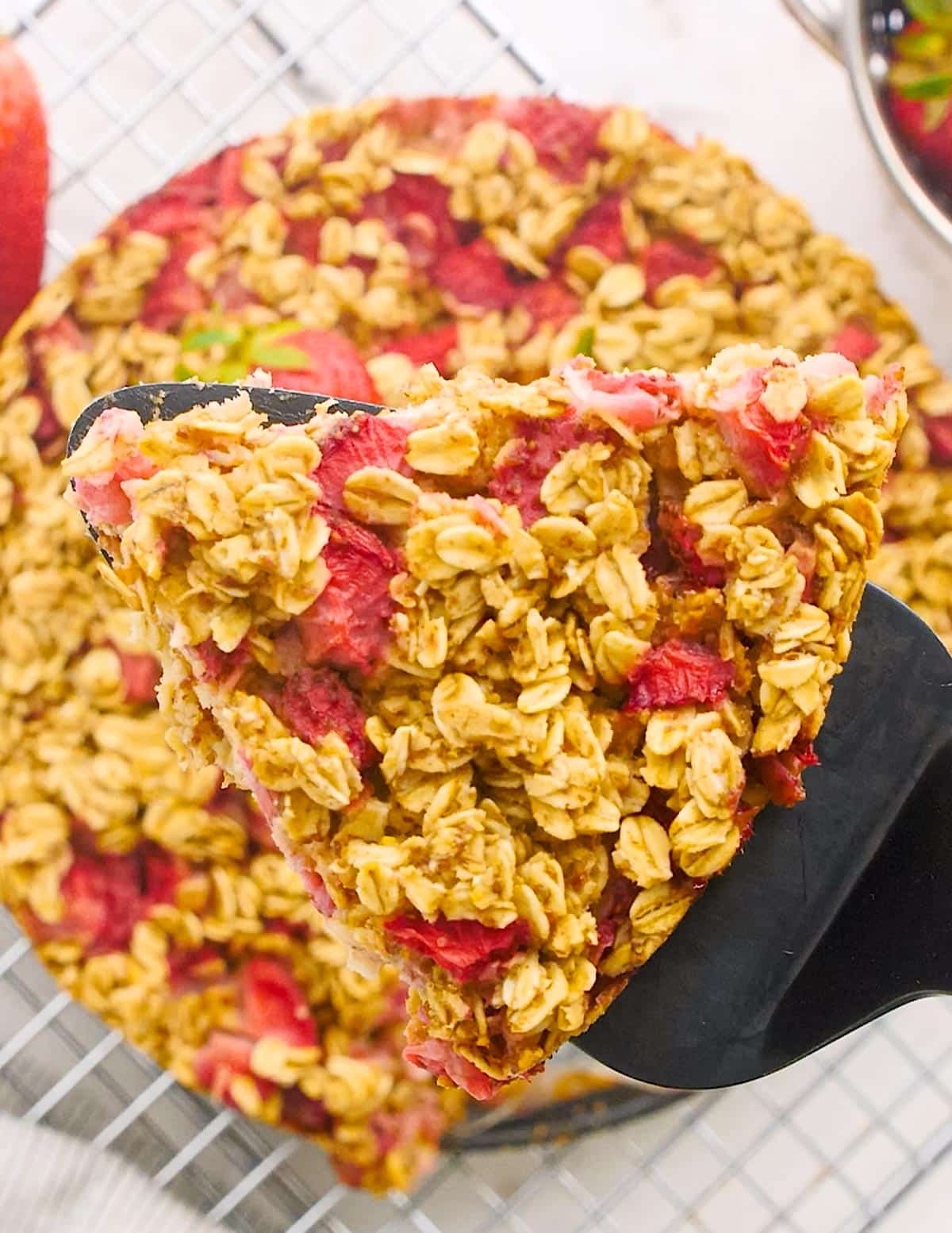 a slice of strawberry baked oatmeal