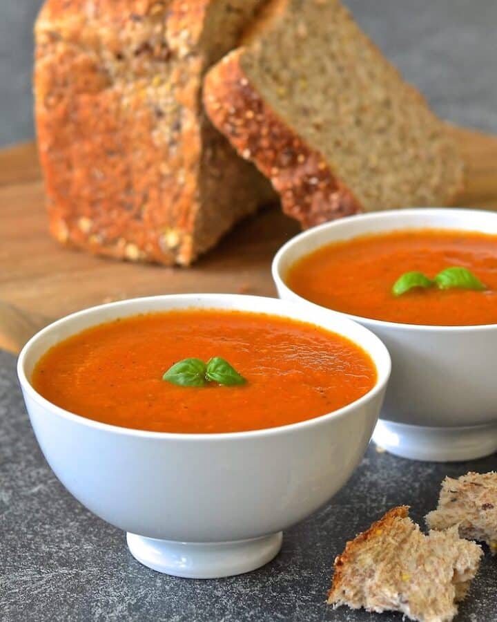 2 bowls of tomato basil soup with whole-wheat bread