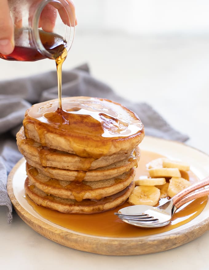 Vegan Banana Pancakes drizzled with maple syrup