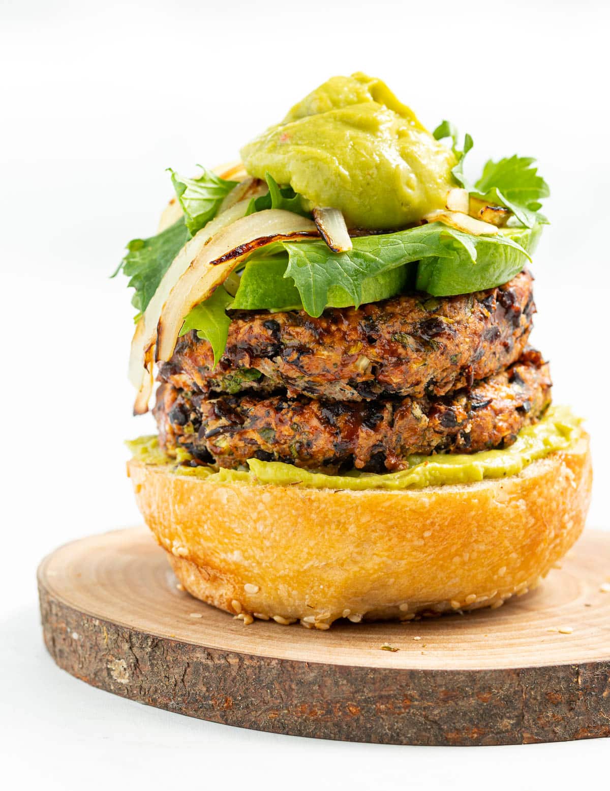 black bean burgers topped with guacamole