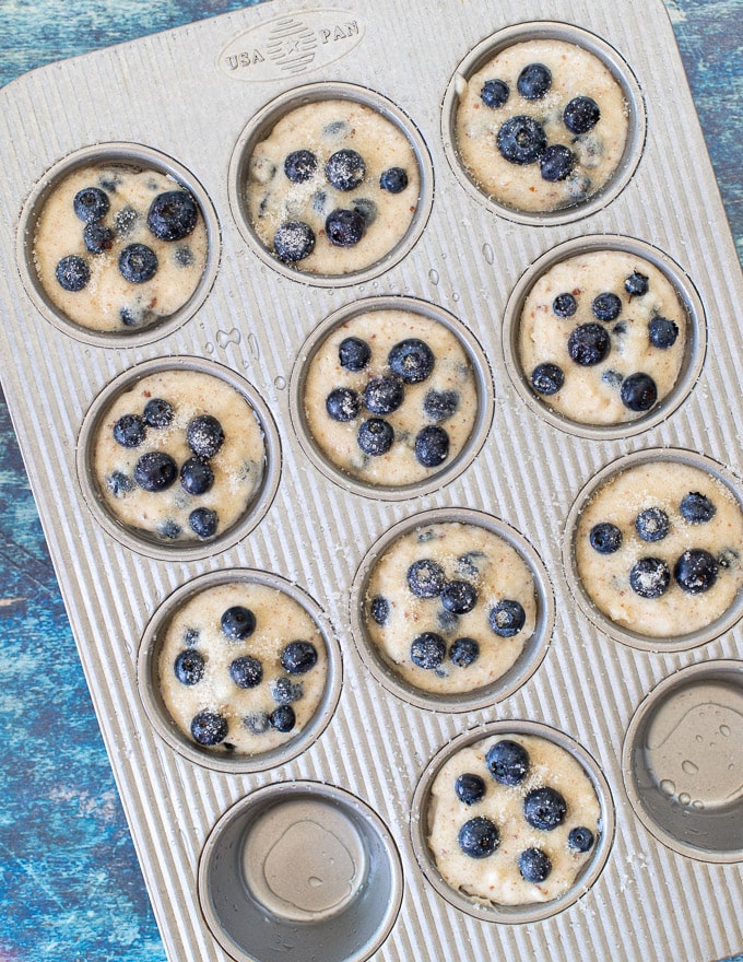 uncooked vegan blueberry muffins in a pan