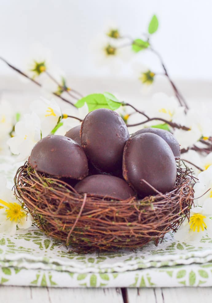 Vegan Caramel Eggs nestled in a faux bird's nest