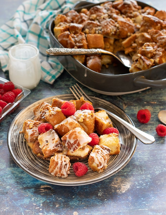 A plate of Vegan French Toast Casserole with raspberries