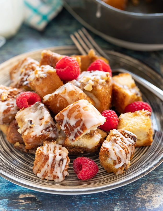 Portion of Vegan French Toast Casserole with fresh raspberries