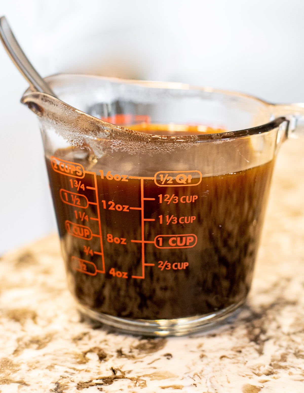 a jug of molasses and boiling water 