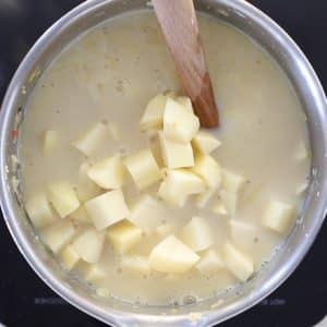 uncooked vegan potato soup in a pan