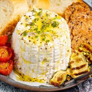 a molded vegan ricotta with olive oil drizzles