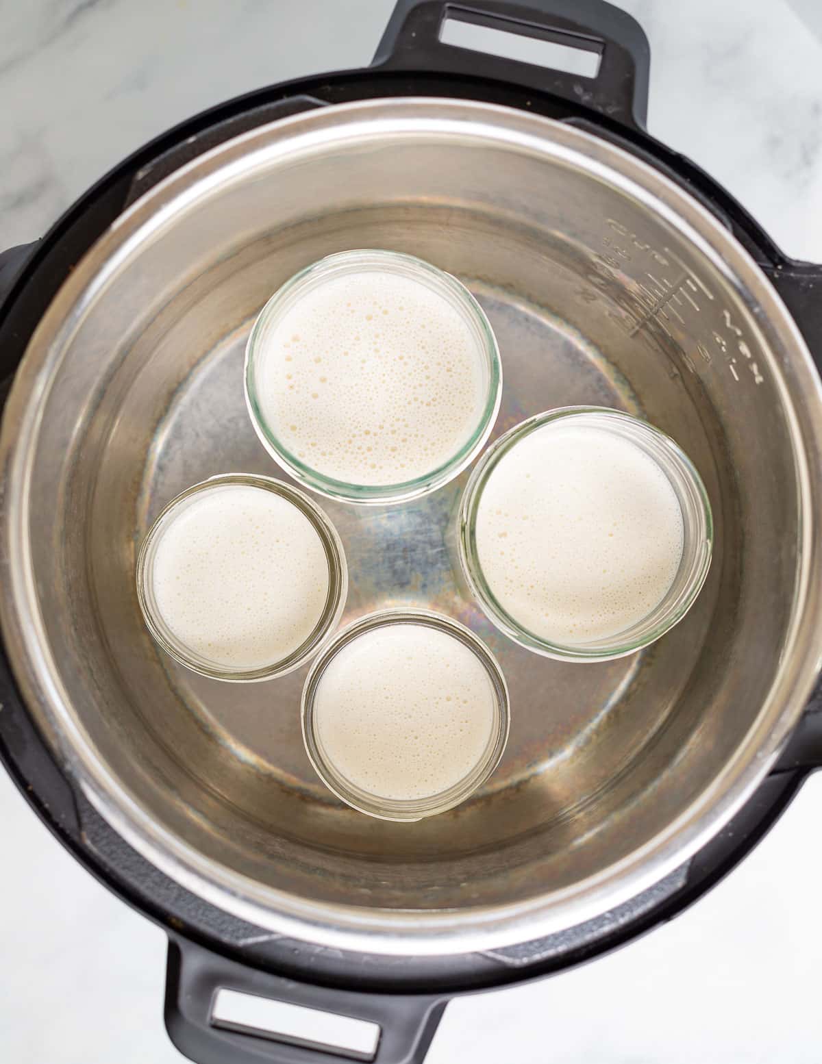 jars of vegan yogurt in an Instant Pot